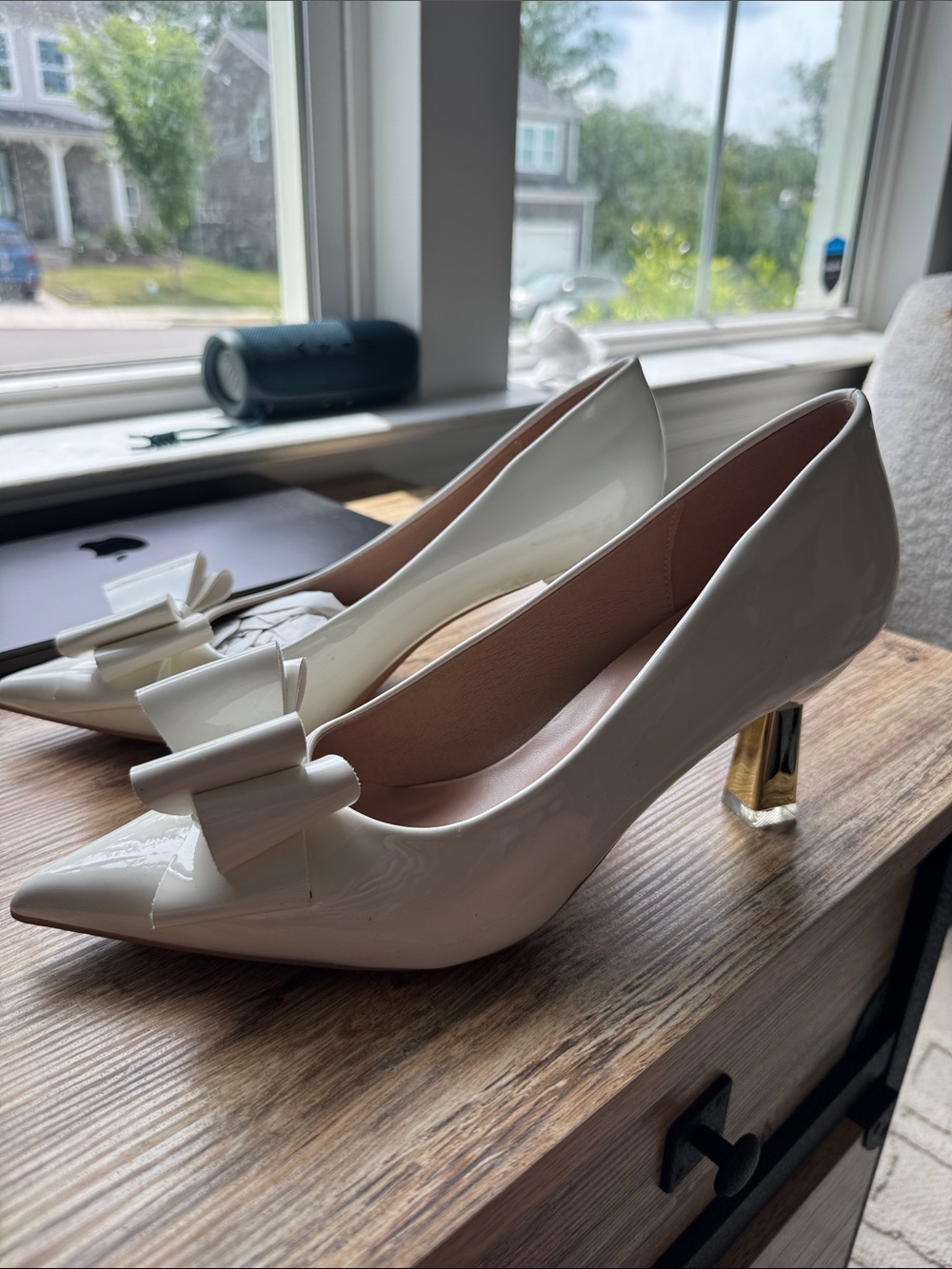 Patent Bow Pointed-Toe Heels in Cream with Gold Accent